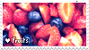 A stamp of several berry fruits, including blueberries, raspberries, and strawberries. There is text at the bottom left that reads 'Love fruits'. The word 'love' is replaced by a heart