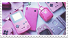 A stamp with an image of several pink handheld consoles and devices, such as a Game Boy Color, a Game Boy Advance, a Nintendo DSi, a Game Boy Advance SP, and other devices