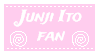 A pink stamp with a lacy border, spirals at the bottom of the stamp, and white text that reads in capital letters, 'Junji Ito fan'