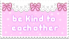 A pink stamp with a lacy decoration at the top and white text that reads, 'Be kind to each other'