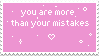 A pink stamp with white text that reads 'You are more than your mistakes'