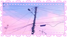 A pastel stamp with a lacy border with an image of a street lamp