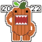 A pixel sticker of a pumpkin Domo-Kun by Gloomlee. The year '2022' is behind him.