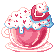 A tea cup with a strawberry milkshake