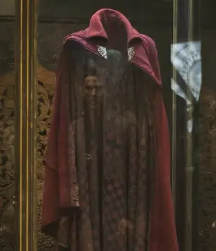 The Cloak of Levitation in a glass display case